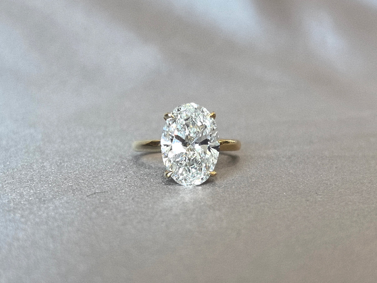 0e26fabe22fca3e88b744fe92fb8d939 Oval Cut Lab Diamond Ring | Hidden Halo Design | Timeless Solitaire | Understated Luxury - Image 1