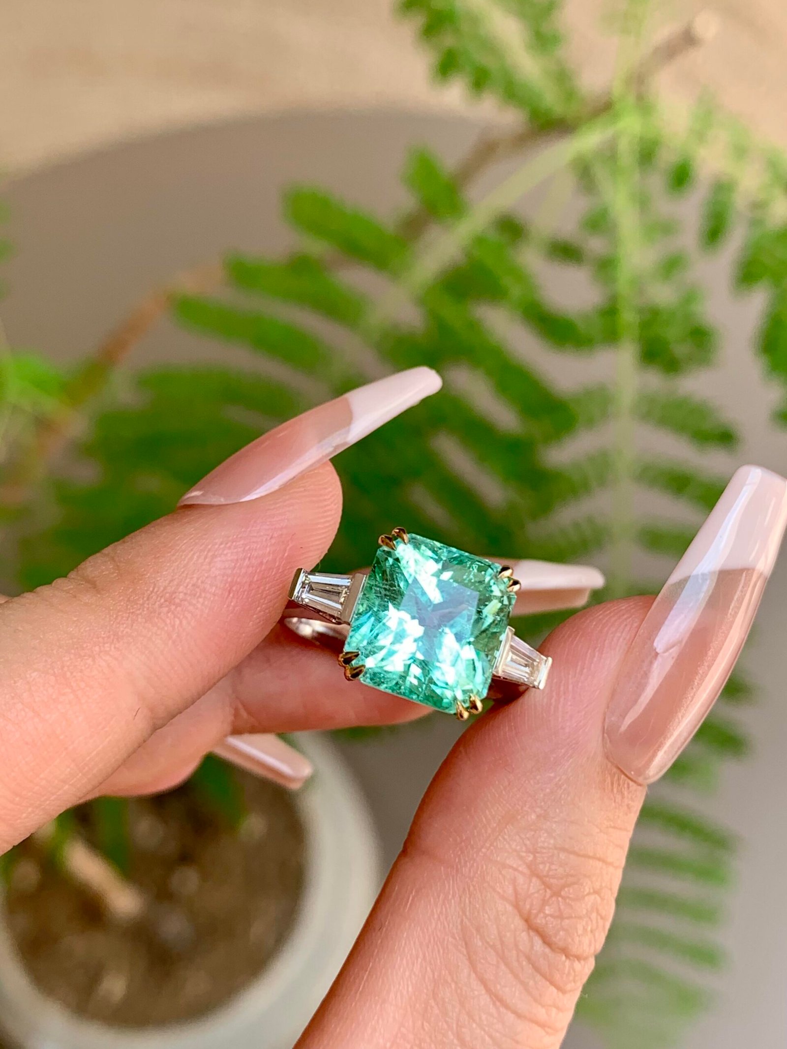 8db2169a1e33c442205a891991fffe5c 6.4-Carat Natural Tourmaline Three-Stone Ring: Radiant Cut with 0.3-Carat Baguette Lab-Grown Diamonds in 18K Gold - Image 1