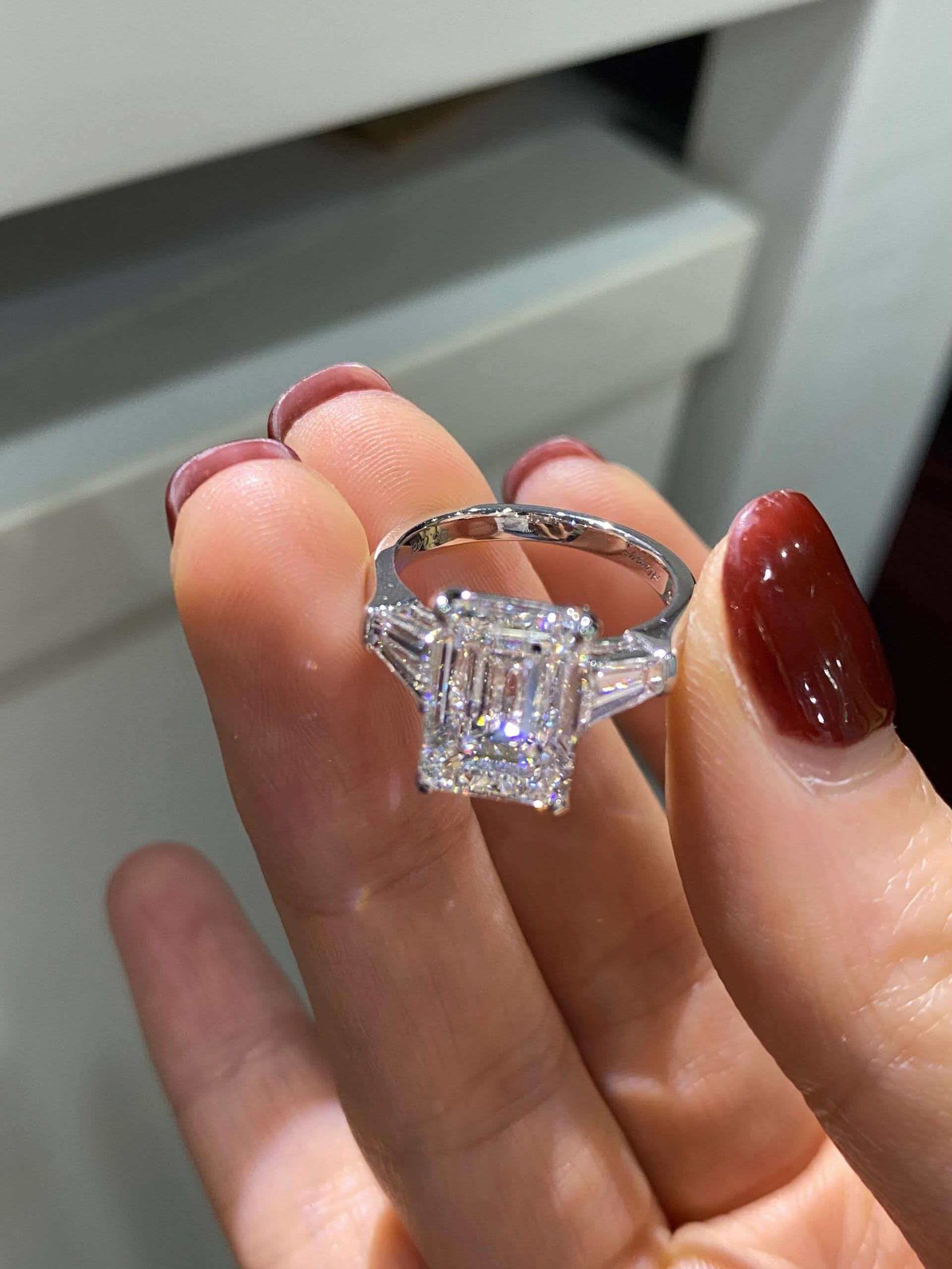 bbdca6a4b5fb801e2b69ab64ae269fd5 5-Carat Lab-Grown Radiant Emerald-Cut Diamond Three-Stone Ring: D Color, VVS1 Clarity in 18K Gold - Image 1