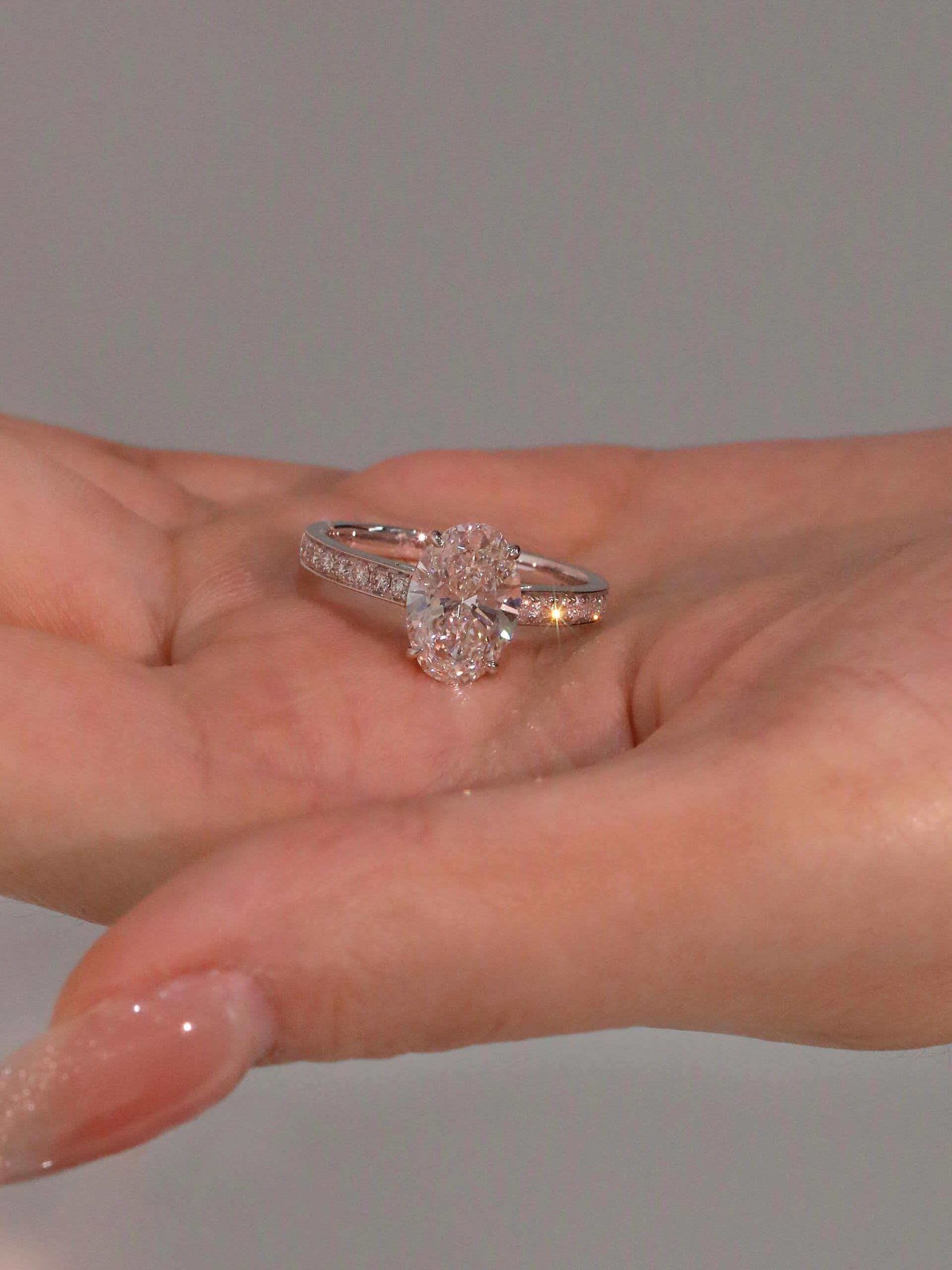 e73b2fb28df11ce4e5e474f98b190b11 2-Carat Lab-Grown Oval Diamond Ring: D Color, VS1 Clarity in 14K White Gold - Image 1