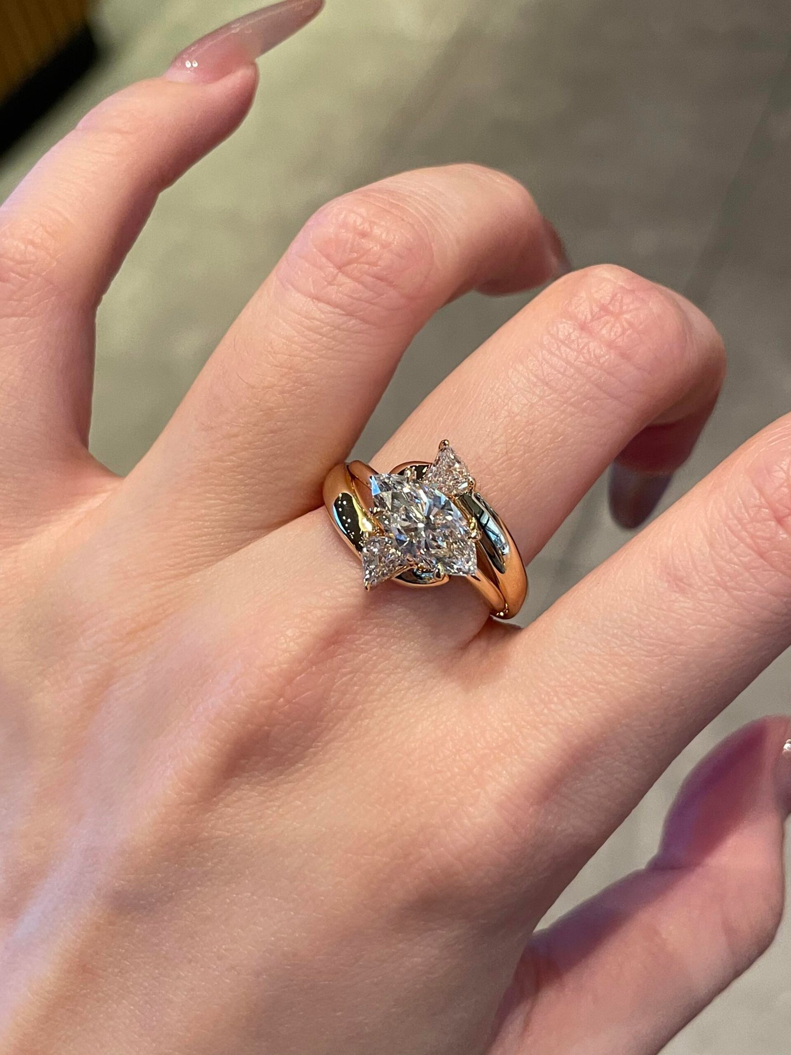f2b47ab3d0ce9ea76a1c240c70b86576 2-Carat Lab-Grown Marquise-Cut Diamond Ring: E Color, VVS2 Clarity with Triangle Accents in 18K Gold - Image 1