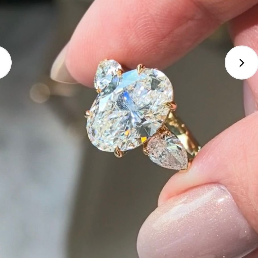 e0408dfb9839b6150cdf055d94557dc7 Oval Cut Three-Stone Laboratory Diamond Ring - Image 1