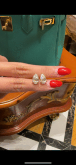 oval cut lab grown diamond rings and earrings.
